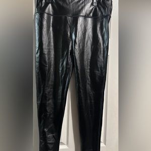 Size 2x shiny black faux leather leggings.